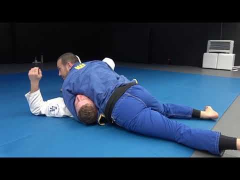 Finishing from side control depending on the reaction of the near arm (Lachlan Giles)